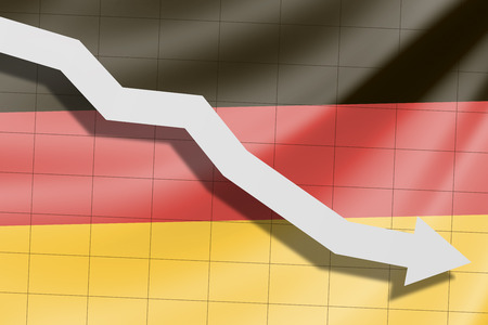 The arrow falls on the background of the German flagの写真素材