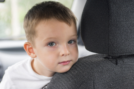 little child in the carの写真素材