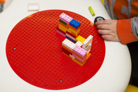 The child collects the Designer. Kids activity in kindergarten or at homeの写真素材