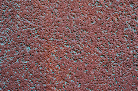 Red cement wall. background