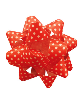 Red gift ribbon bows isolated over white background. Red Christmas bow isolated on white backgroundの写真素材
