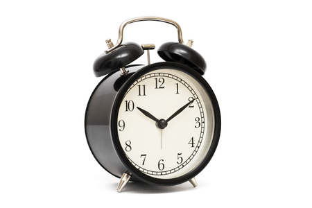 Black alarm clock isolated on white. Black vintage alarm clock isolated on white backgroundの写真素材