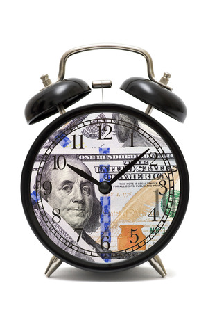 Alarm Clock, clock face with dollars banknote. Clock and banknotes. Time is money concept. Concept of business planning and financeの写真素材