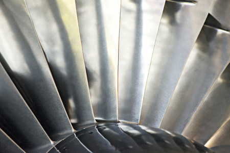 Jet engine blades. Front of the aircraft engine for background. Turbo-jet engine of the planeの写真素材