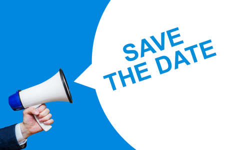 Male hand holding a megaphone with Save The Date bubble. Speaker. Banner for business, marketing and advertising.の写真素材