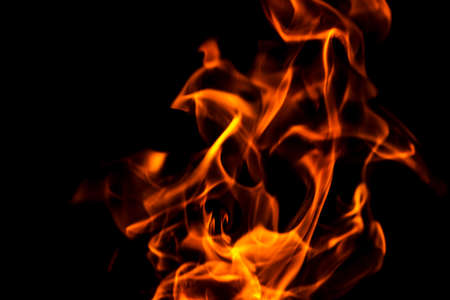 Fire flames abstract on black background. Fire and burning flame on dark background.の写真素材