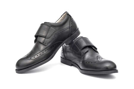 Black leather shoes isolated on white background. Classic mens black leather shoes isolated on white.の写真素材