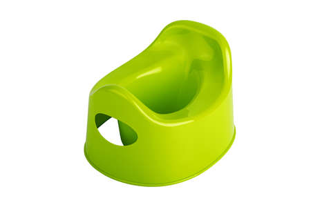 Green childish plastic toilet pot isolated on a white background. Green childish plastic pot for babies on a white background.の写真素材