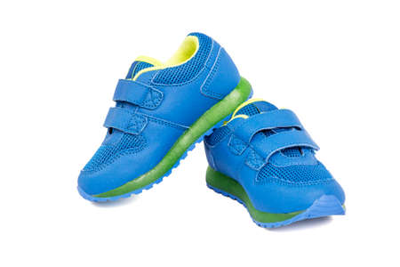 Childs sport shoes isolated in white background. Stylish kids sneakers. Sport shoes.の写真素材