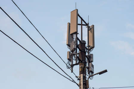 Cell site base station. Telecommunication tower. Wireless communication antenna transmitter.Digital wireless connection system.の写真素材