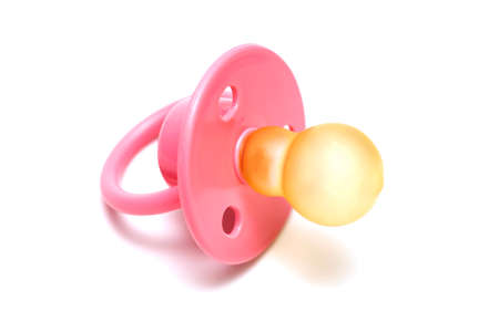 Baby pink mannequin isolated on a white background. Pink babys pacifier isolated on white...