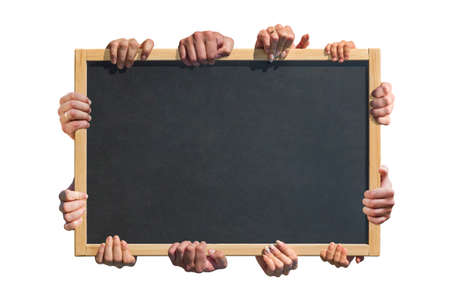 Many hands hold a blank poster for advertising on an isolated white background.の写真素材