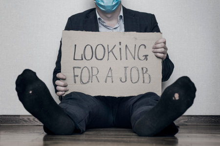 A young businessman who lost his job due to quarantine is looking for a job