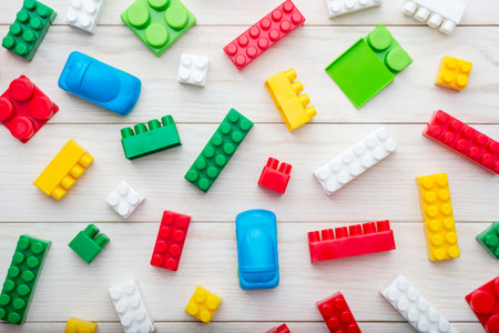 Colorful plastic toy blocks. Colorful plastic toy blocks on wooden background