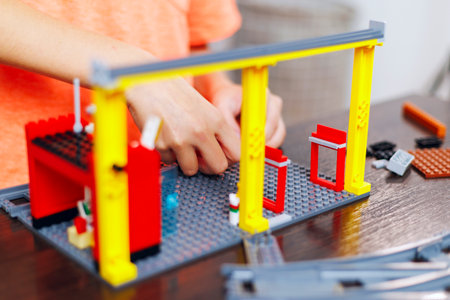 Child Building with Colorful Toy Construction Setの写真素材