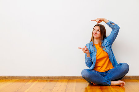 Young Woman Gesturing Space for Textの写真素材