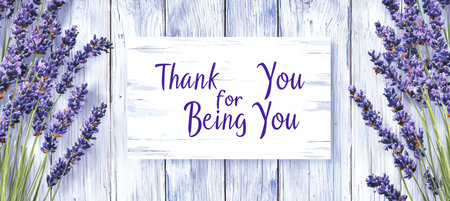 Mothers Day Card Design with Lavender on Wooden Background for Heartfelt Messagesの素材