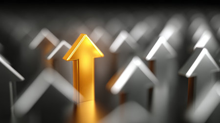 A bright golden arrow stands out among gray arrows, symbolizing leadership and ambition. The image features a soft bokeh background, metallic texture, and dramatic studio lighting.の素材