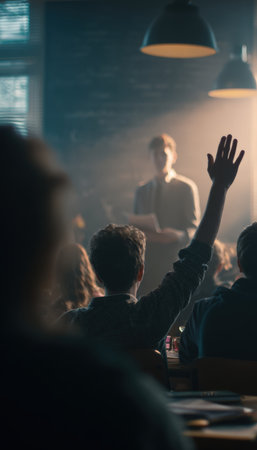 A classroom scene with a student raising a hand in the foreground. The teacher stands with notes, illuminated by soft, cinematic lighting, creating an engaging educational atmosphere.の素材