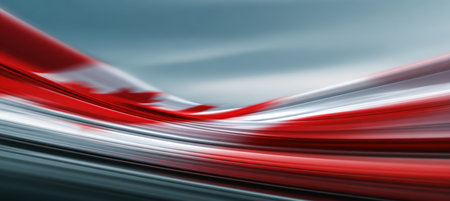 Abstract long-exposure photograph capturing the motion of the Canadian flag. Features red and white streaks with a softly blurred sky, presented in an elongated panoramic format.の素材