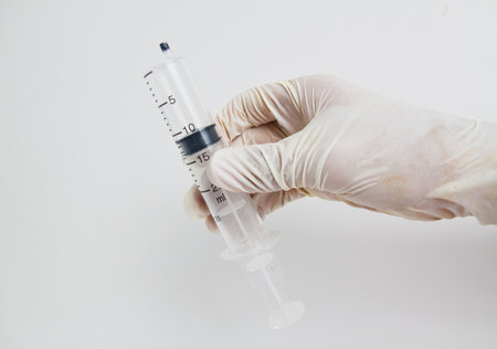 Put gloves on hand needle.の写真素材