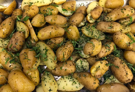 pan full of potato wedgesの写真素材