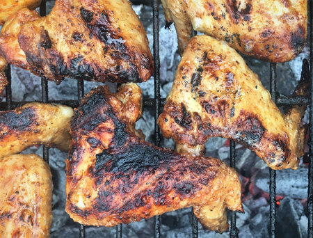 Grilled chicken Leg on the grillの写真素材