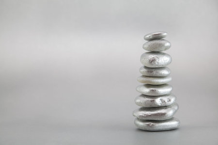 Balancing silver pebblesの写真素材