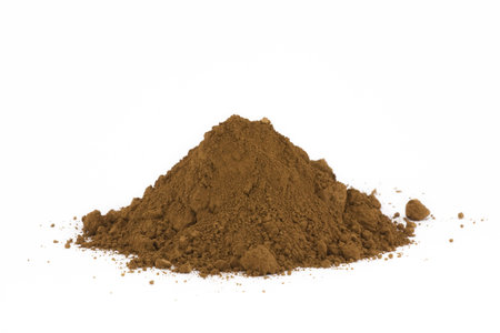 Pile of soil isolated on whiteの写真素材
