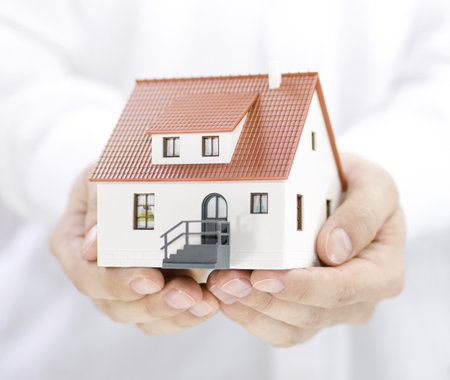 Home in handsの写真素材