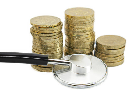 Financial health. Stethoscope with coinsの写真素材