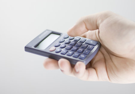 Calculator in hand
