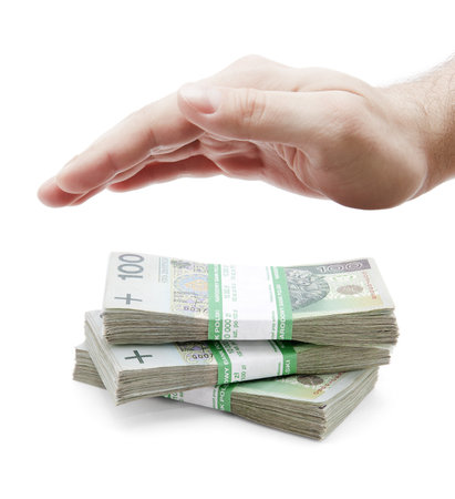Polish money and hand on whiteの写真素材