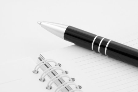Notebook and pen close-upの写真素材