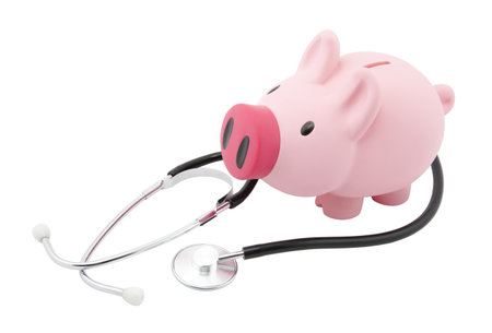 Piggy bank and stethoscope with clipping pathの写真素材