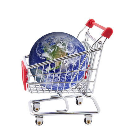 Shopping cart with globe isolated on whiteの写真素材