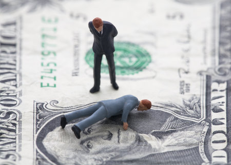 Financial crisis. Figure of businessman on one dollar billの写真素材