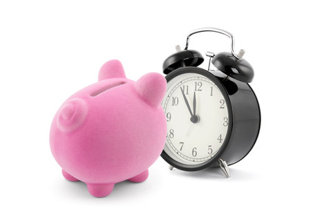 Piggy bank with alarm clockの写真素材