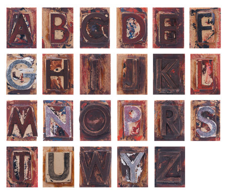 Old wooden alphabet letters isolated on white backgroundの写真素材