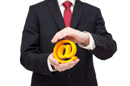 3d email symbol protected by hands. Clipping path included.の写真素材