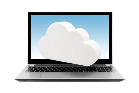 Laptop with cloud isolated on white. Cloud computing network concept.の写真素材