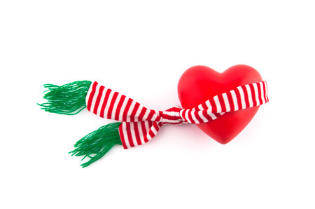 Red heart wrapped in a scarfの写真素材