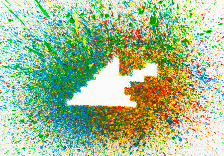 Computer arrow shape over colorful splashesの写真素材