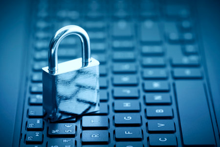Computer security concept. Padlock on computer keyboard