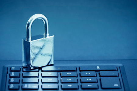 Computer security concept. Padlock on computer keyboard
