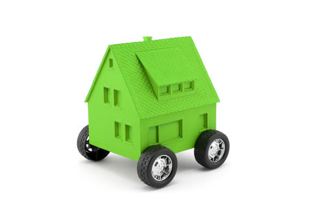 Green house on wheels isolated on whiteの写真素材