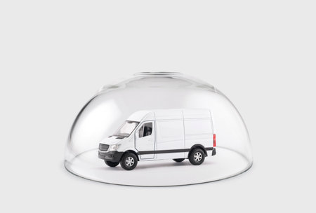 Transport white van car protected under a glass domeの写真素材