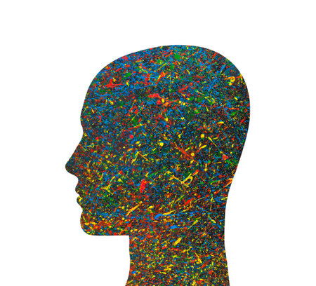 Human head silhouette with colorful watercolor splashesの写真素材