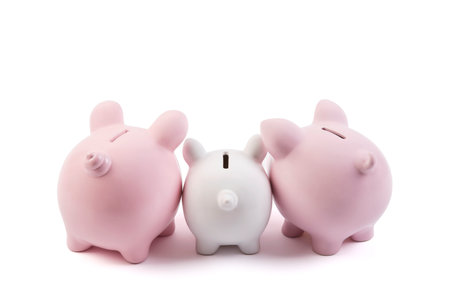 Three piggy banks on white background with clipping pathの写真素材