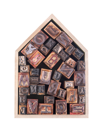House with wooden block letters isolated on white backgroundの写真素材